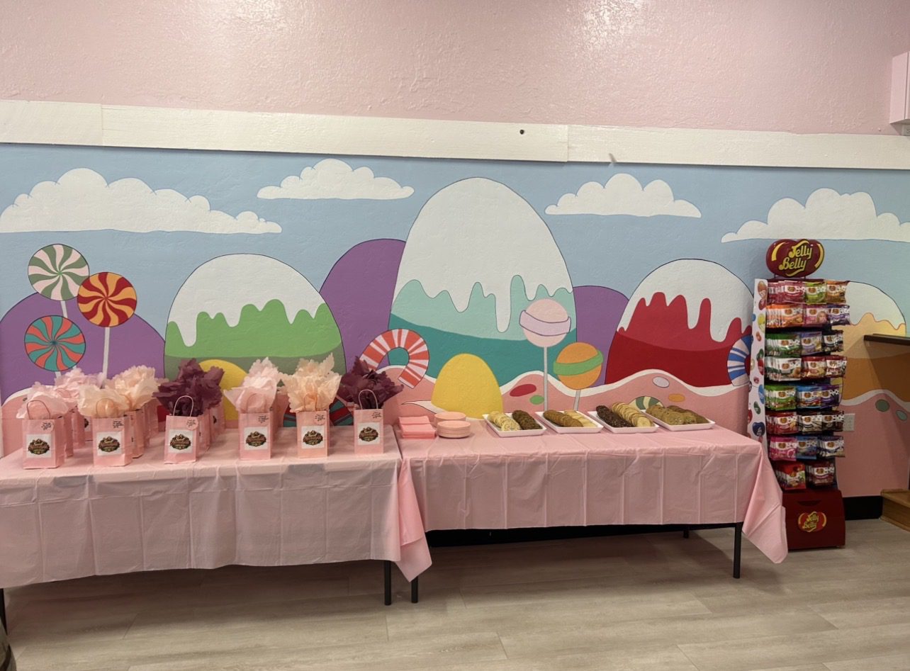 Pink tablecloth with candy decorations